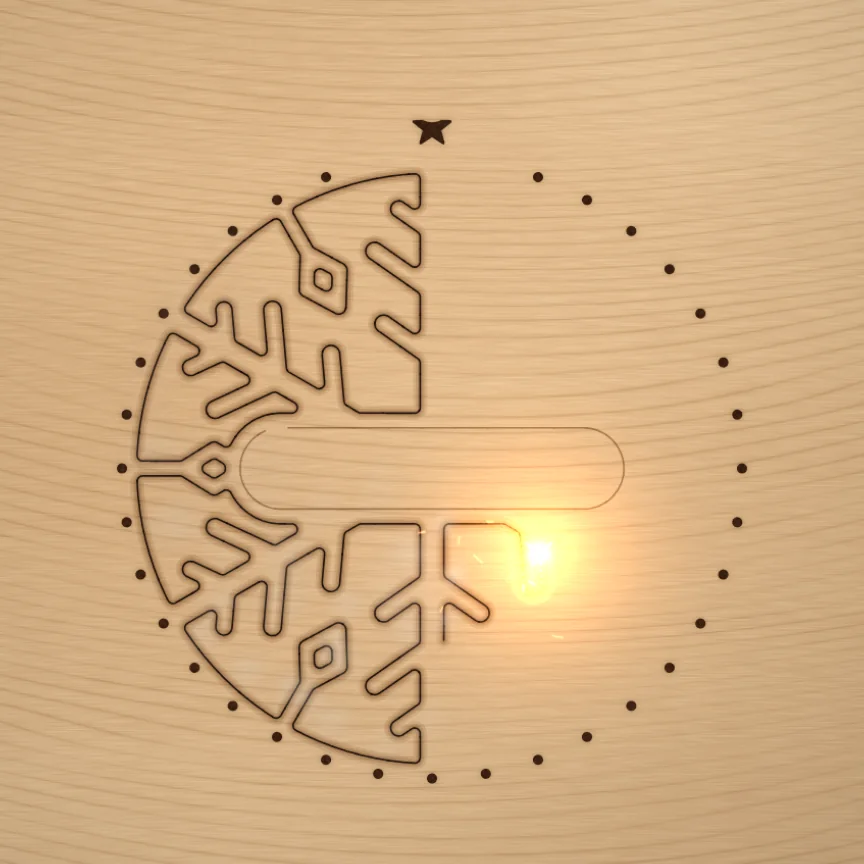 A still from the Laser Clip Maker engine: the laser halfway through cutting a snowflake ornament in plywood